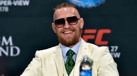 conor mcgregor white suit